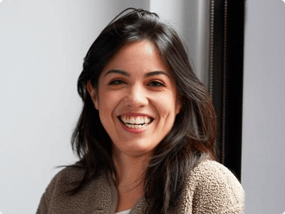 An academy instructor smiling